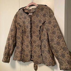 Eyelet jacket with ruffled trim along all openings